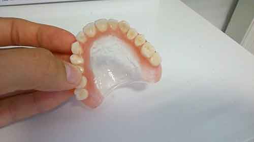 علت لق شدن دندان مصنوعی